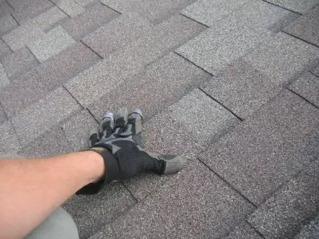 inspecting the roof